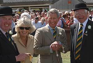 Honorary Show Director Bill Cowling, , HRH The Duchess of Cornwall, HRH The Prince of Wales and the Chief Pig Steward, Peter Brier