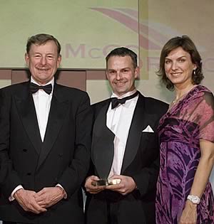 Adrian Cannon (centre) of Great Tew Estate, Oxfordshire, received his Farm Manager of the Year accolade from BBC news reader Fiona Bruce and Jeremy Lamb, UK sales director, McCormick Tractors International Ltd. 