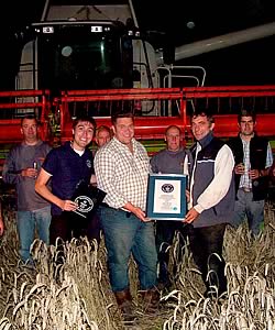 Keith Challon (centre) and Kevin Yates receive the record certificate from Carlos Martinez of Guinness World Records (right).