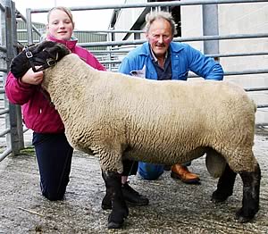 Chris and Vicky Newsham with their Skipton Suffolk champion.