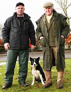 John Bell, right, with Dot, top priced dog at Skipton, and buyer Jock Sutherland