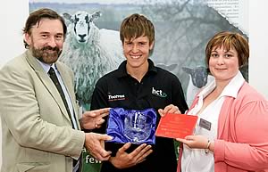 Iwan Jones receives his award from NSA chairman, Jonathan Barber and sponsor, Intervet Schering Plough’s Joanne Worthington