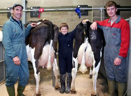 Pictured with the July Craven Dairy Auction first and second newly calven cows are, from left, Philip Penrose and his sons Will, aged 11, who has just left Silkstone Junior School and will start at Penistone Grammar after the summer holidays, and 17-year-old Joe.