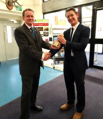 (left to right): Andrew Vaughan presenting the trophy to Ben Howard