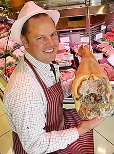Butcher David Lishman with one of his new home-cured hams.