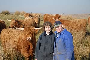 Neale and Janet McQuistin with their Highland cattle