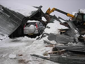 snow damaged building