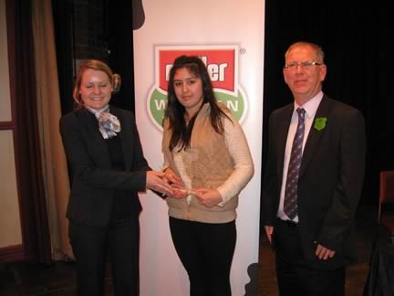 Winning actress Makayla Brass, Drigg YFC being presented with her award