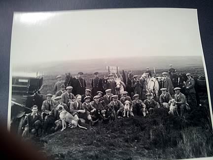 a shooting party on the moorland in 1927 with keepers, chauffeurs and ponies