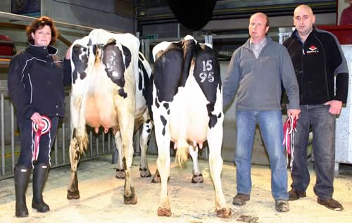 Claire Lawson with the family’s latest Craven Dairy Auction champion, joined by the reserve champion with James Drake, left, representing Keith Downs, and co-judge Michael Longster.