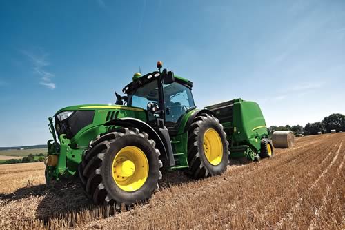 John Deere 6150R tractor and F440R fixed chamber round baler