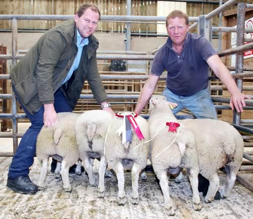 Keelham Farm Shop’s James Robertshaw, left, checks out his Skipton June prime lamb champion acquisitions with vendor Tim Robinson.