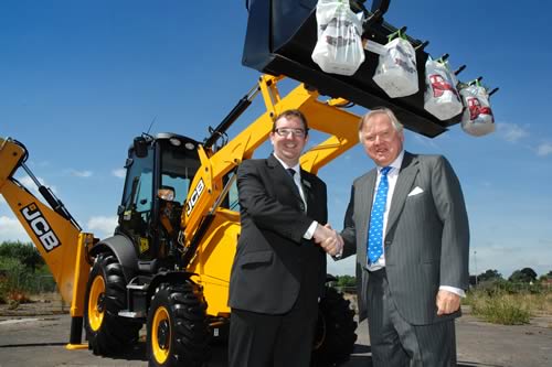 JCB Chairman Lord Bamford, right, pictured with Waitrose Head of Retail Operations Mark Gifford, as news is announced of a new store creating up to 180 jobs