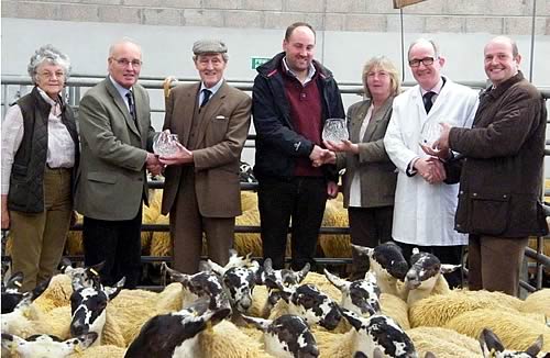 NSA Scottish Region Treasurer Mamie Paterson; John Macfarlane; NSA President the Duke of Montrose; Iain Macfarlane; NSA Scottish Region Chairman Sybil MacPherson; David Leggat; NSA Scottish Region Development Manager George Milne.