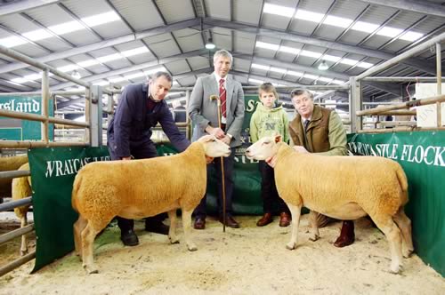 British Charollais Sheep Society chairman and Skipton females show David Mawhinney (with crook) is pictured with three generations of the Geldard family – Richard, George, aged nine, and John, along with their Skipton champion and reserve.