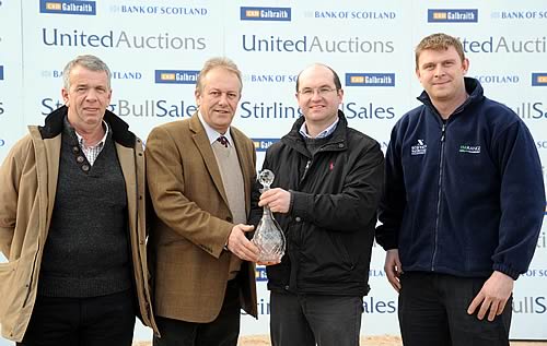 Beef Shorthorn Society’s Mark Holmes presents the award to Buccleuch Estate’s farm manager, Sion Williams with herdsmen, left Dougie Rennie and Malcolm Wilson