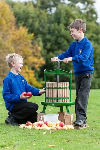  Lawrence Whitmarsh (8) and Josh Snowdon (9) from Pickhill CE Primary School juicing apples at the Yorkshire Agricultural Society’s celebration of National Apple Day at the Great Yorkshire Showground,
