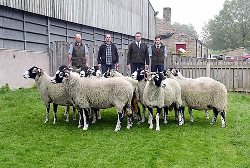 Pictured with the champion pen of Skipton Swaledale ewe lambs are, from left, co-judge Robert Tarbatt, exhibitor Robert Cowperthwaite, co-judge Ian Lancaster and his 15-year-old son Richard, who assisted with the adjudication.