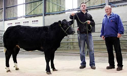 Steven Walker is pictured with the family’s 2015 Skipton suckled calf champion, joined by show judge Mike Thuey.
