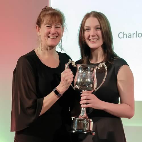 Charlotte Walton of Carrs Billington receives the AHDA Cup for the best overall student from Gaynor Hillier of sponsors Elanco.