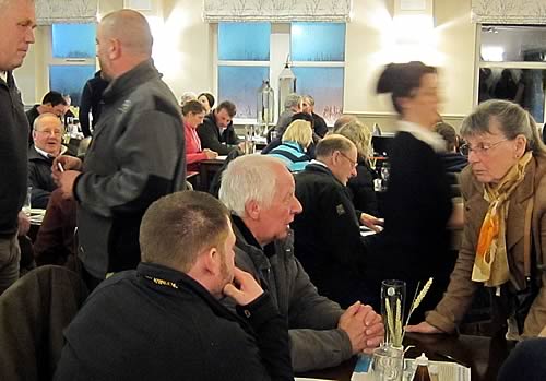 Farmers deep in conversation at the advice meeting in Hawes