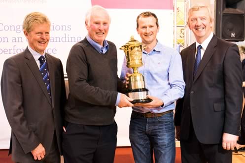 Prof David Leaver, former RABDF president (left) and Philip Kirkham, NMR director (right) presenting Roland (second from left) and Simon Bugler (second from right) with the 2016 RABDF/NMR Gold Cup